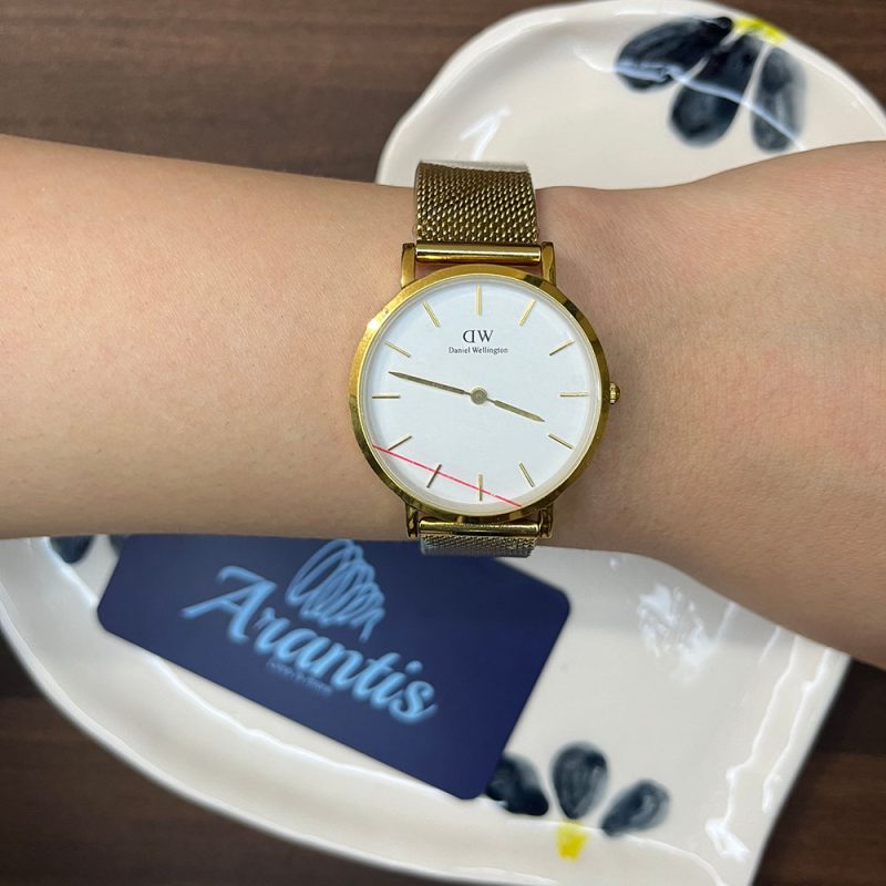 ساعت دنیل ولینگتون طلایی زنانه بند حصیری